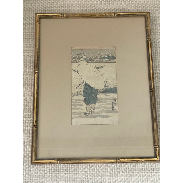 This stunning woodblock print on rice paper is possibly the Edo period. It is of a lone figure silently looking out over...