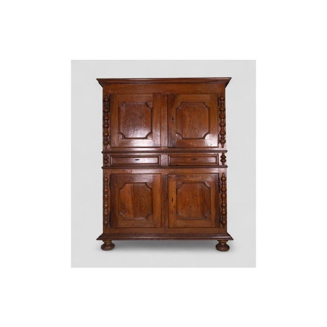 Majestic antique two-piece sideboard in solid wood, featuring an imposing yet well-balanced structure. The piece includes...