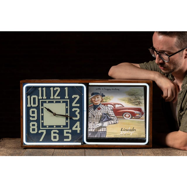 c. 1940s-1950s; Electric Ad Clock Co. - Lancaster, PA Electrically illuminated revolving advertising clock with a warm...
