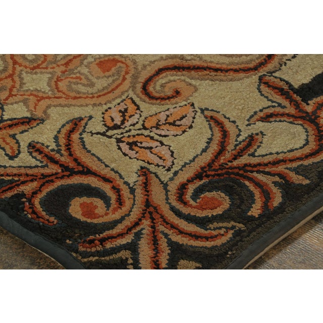 This 3x4 antique hooked rug is an exciting new addition to Rug & Kilim’s Antique collection; a classic folk-art...
