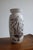 Gorgeous vase in the "Grazia" serie by Stig Lindberg. In a silk-matte white glaze with silver colored flower motif it was...