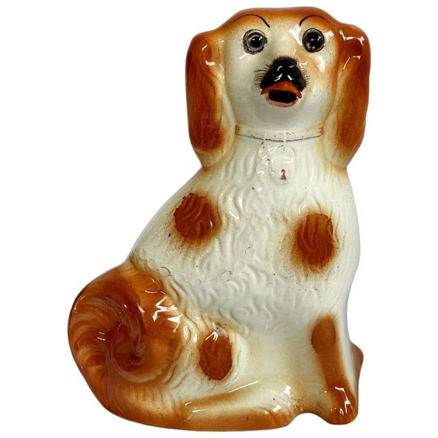 A handsome and rare pair of Staffordshire mantle Spaniel dogs that were fabricated sometime around 1880. Both dogs have...