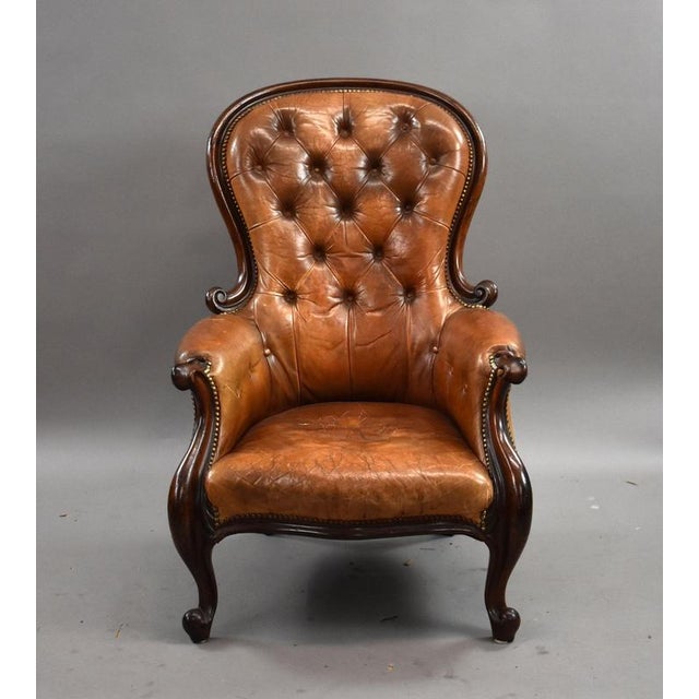 Victorian Deep Buttoned Leather Armchair Item Code: RA1 A handsome Victorian period leather armchair of classic form,...