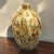 This vintage hand-blown art glass vase in a brown and cream tortoise-style design stands at 13 inches tall. Made in Italy,...