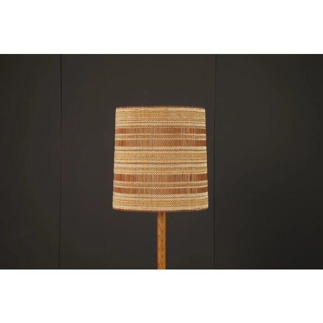 A rare and striking lampshade designed by German-born, California-based textile artist Maria Kipp, celebrated for her...