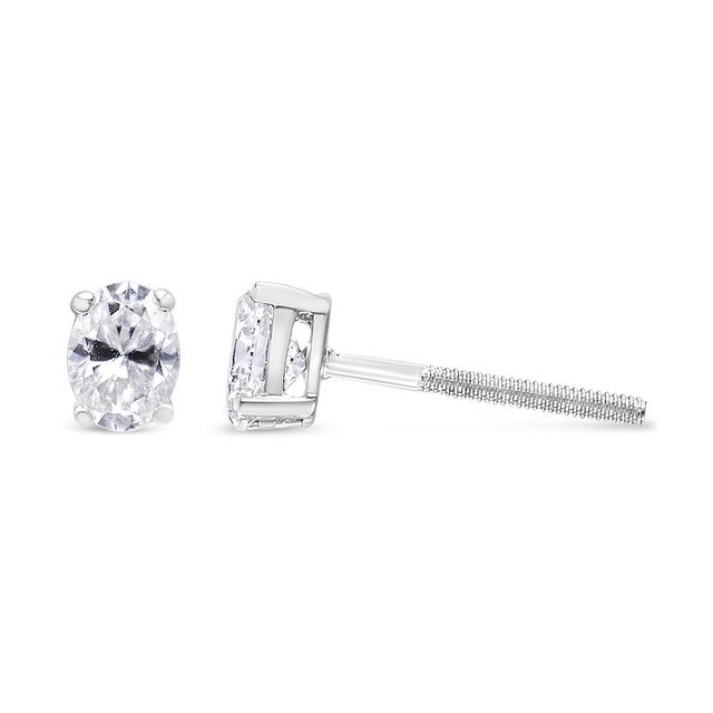 Contemporary 14K White Gold 1/2 Cttw Lab Grown Oval Solitaire Diamond Stud Earrings (F-G Color, VS2-SI1 Clarity) For Sale - Image 3 of 5