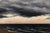 Storm by Barbara Hack | Oil on canvas panel Dark clouds over a turbulent sea at sunset. For Sale