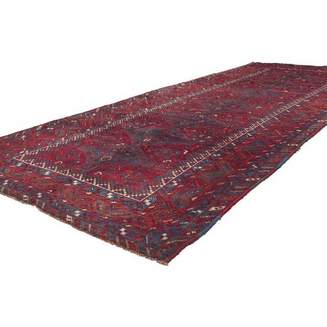 61239 Antique Persian Tribal Shiraz Rug, 04'00 x 10'04. In this exquisite hand-knotted wool antique Persian Shiraz rug,...