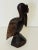 Vintage handcarved of tropical wood sculpture Pelican on rocks. Coastal Safari style decor.
