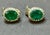 These stunning post back earrings with French clip feature a natural oval-shaped emerald weighing total approximately 5...