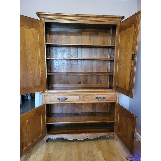 Two-Piece Norman Buffet – Solid Oak – Maison Doudard For sale: a superb two-piece buffet in the Norman style, crafted from...