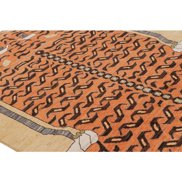 Hand-knotted in wool, this 6x9 modern tiger pictorial rug is a bold addition to the Rug & Kilim exclusive Tiger line. On...