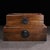 A beautifully crafted set of two Chinese hardwood nesting boxes, likely made of Huali (rosewood). Each box features a...