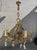 Two Louis XV style brass chandeliers 5 and 6 branches. First chandelier dimension width 60, depth 60, height 65. Second...