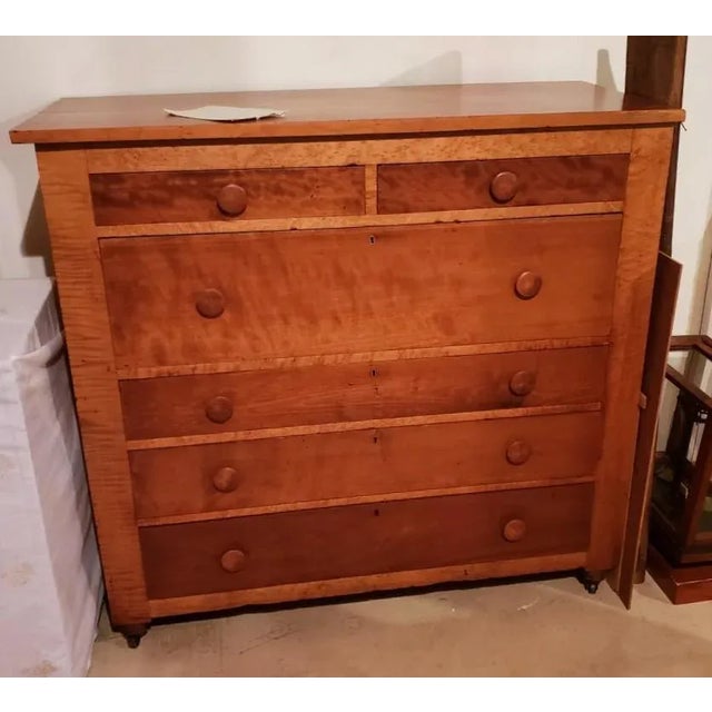 This beautiful dresser offers a beautiful face of tiger maple. Sure to add warmth to your space! This dresser would be...