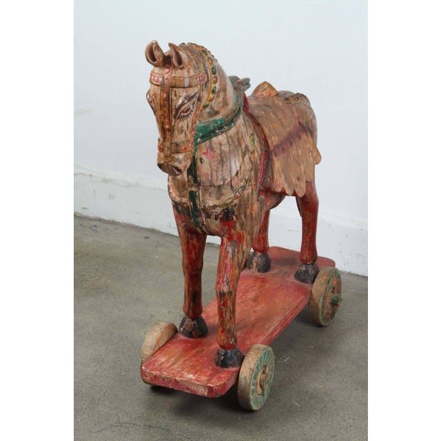 Indian Pair of Monumental Indian Polychrome Carved Wood Horses on Wheels, 19th C. For Sale - Image 3 of 17