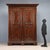 Baroque style wardrobe dating back to the late 19th century, made of walnut-stained beech. The structure features a front...