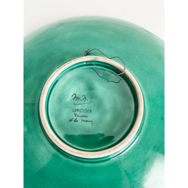 Rare mid-20th century decorative wall plate in vibrant emerald green glaze. Depicts a hand painted hunt scene with western...