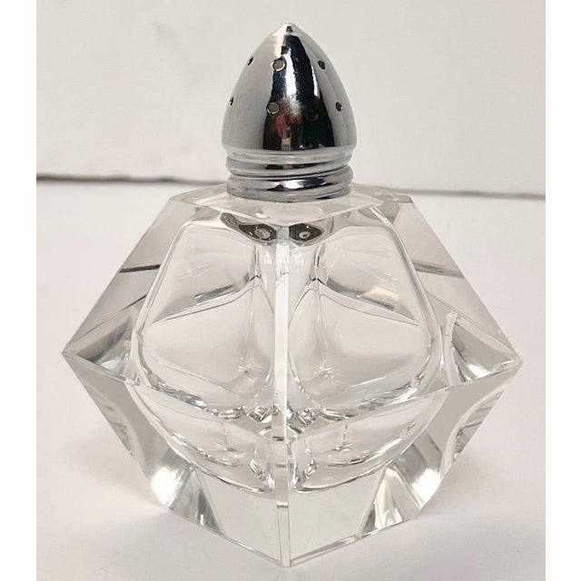 A single shaker that can be used for sugar or cinnamon on a breakfast tray. There are no markings. Just a nice chunky...