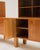 A Scandinavian-style modular sideboard, a piece that stands out for its functional design and the warmth of light-toned...