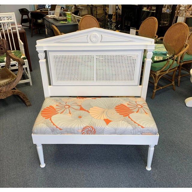 Unique neoclassical caned headboard from the early 20th century has been re-purposed into a fun bench. Upholstered in a...