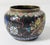 We are selling this small Chinese cloisonne enamel jar. The jar has dragon chasing a flaming pearl motif in very unusual...
