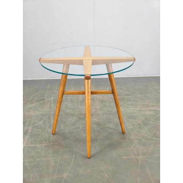 Exceptional round coffee table designed by Jiří Rathouský and produced by Krásná Jizba, one of the most important...