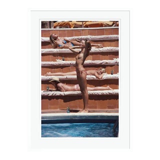 Sunbathing on Capri 1980 by Slim Aarons White Framed C Print For Sale