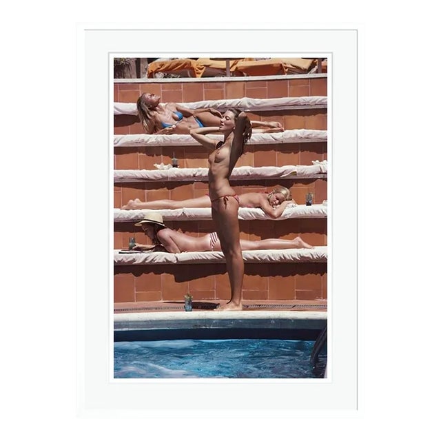 Sunbathing on Capri 1980 by Slim Aarons White Framed C Print For Sale