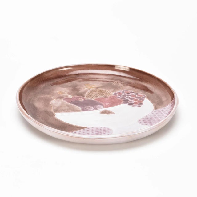 Large circular dish by Robert and Jean Cloutier, the twin brothers of French ceramics. Discover in addition on these...