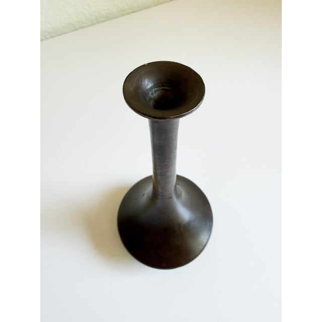 Antique Japanese bronze vase from the Meiji period (1867-1912). Features an elegant narrow neck and light, natural patina,...