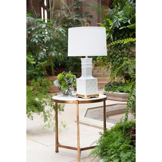 Inspired by the ornate carved ceiling design in the billiard room, the lila lamp-named in honor of one of george...