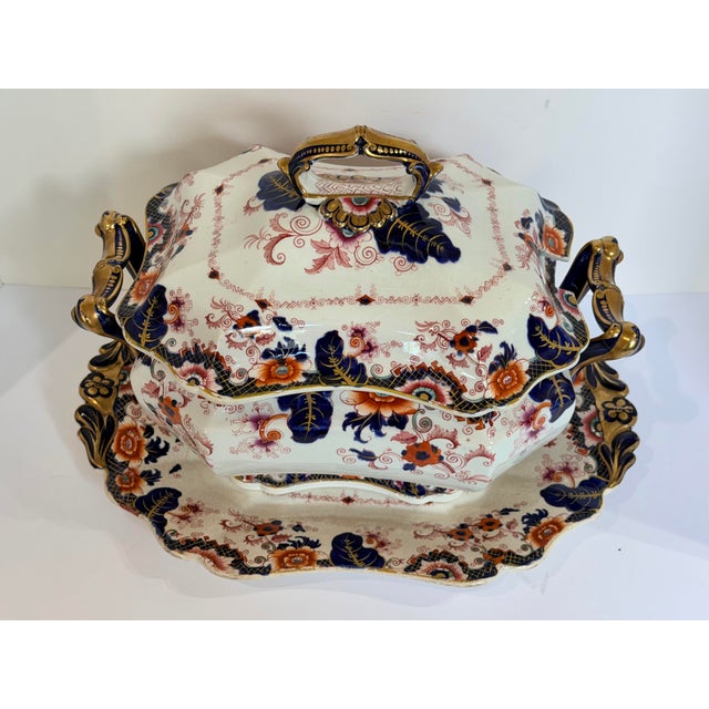 A richly decorated early 19th-century English ironstone covered tureen with matching undertray in the highly desirable...