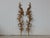 A pair of Italian carved giltwood wall decorations from the early 19th century, with scrolling foliage. We currently have...