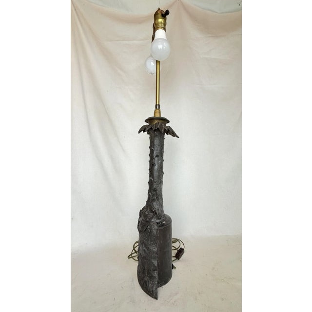 This beautiful sculptural lamp is beautifully cast and depicts a palm tree form.