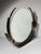 Curtis Jere brass circular round mirror. Style of Paul Evans Slight bend at bottom area. I believe a metal shop should be...