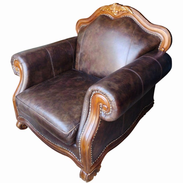 Animal Skin Indulge in the Rich Heritage and Exquisite Craftsmanship of the Aria Leather Chair and Ottoman Set. For Sale - Image 7 of 12