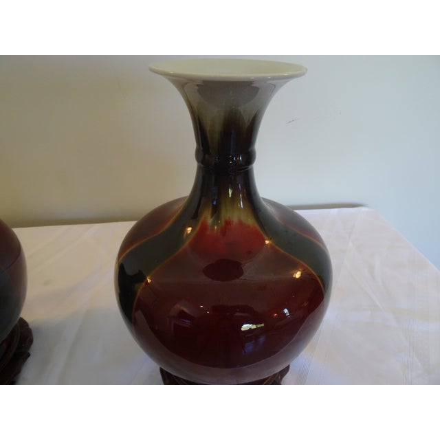 Vintage Flambe Sang De Douf Vases With Rosewood Stands For Sale - Image 4 of 4