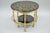 Vintage Hollywood Regency faux bamboo solid brass and glass nesting tables. This unique set features three round brass...