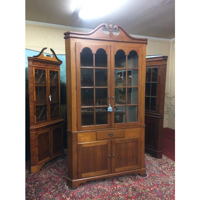 Item: Vintage Cherry Corner Cabinet (two piece). Unmarked (likely custom made). Age & Condition: Circa 1980. Good, some...