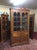 Item: Vintage Cherry Corner Cabinet (two piece). Unmarked (likely custom made). Age & Condition: Circa 1980. Good, some...