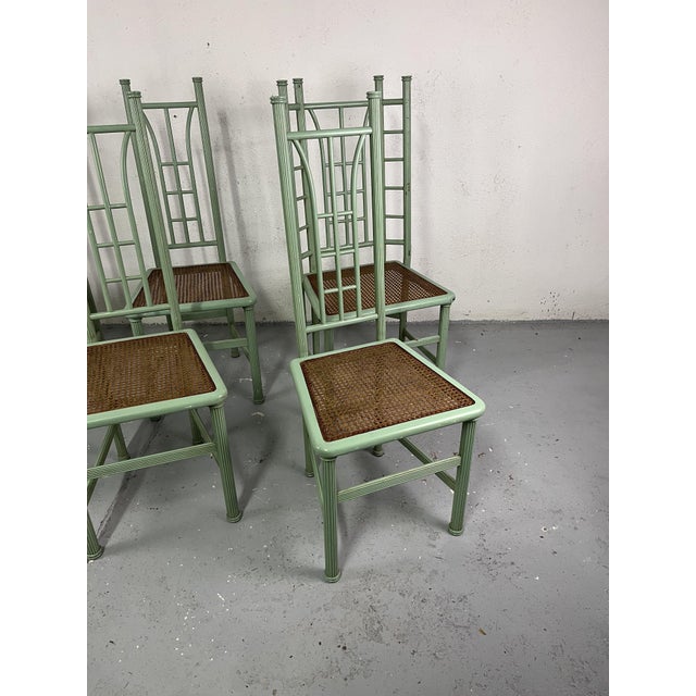 Set composed of 6 chairs, including two at the head of the table with a wide backrest, painted wooden structure and Vienna...