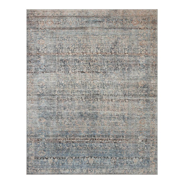 Touting richly saturated colors and a distressed pattern, the Billie Collection captures the look of a well-worn antique...