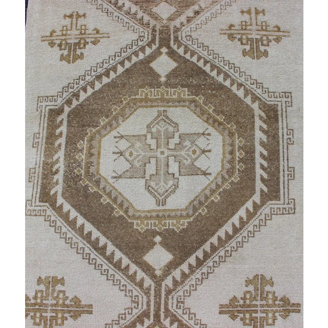 Subdued Vintage Hand Knotted Turkish Oushak Runner With Medallions in Cream and Brown For Sale In Atlanta - Image 6 of 8