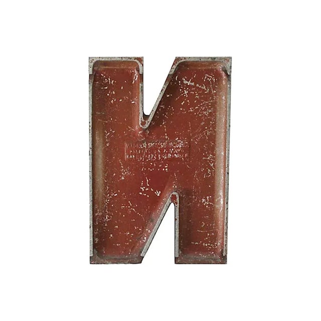 Circa 1950 drive-in sign, aluminum black and silver letter N, stamped "Wagner Sign Service Inc." on back. Letter has slots...