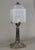 Simonet frères & Dieupart A beautiful French 1925-1930 art deco lamp in nickel plated solid brass or bronze holding a...