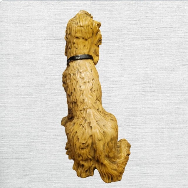 A wonderful vintage plaster mold style Afghan Hound dog life size statue. This is such a wonderful vintage piece which...