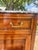 Elegant 19th-century Louis XVI style secretary desk, crafted in richly figured wood with a warm, polished finish....
