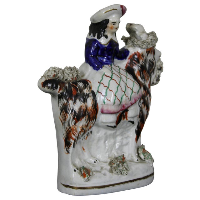 Antique 19th century Staffordshire England porcelain figurine of a Scottish girl dressed in traditional attire with plaid...