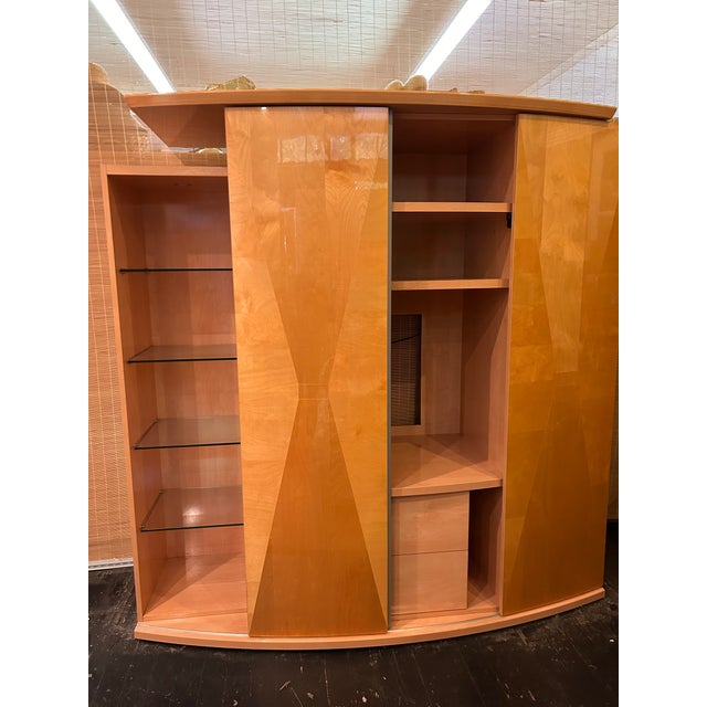 This is a Italian made entertainment center attributed to Alf Italia, a substantial Italian modern wall unit designed to...